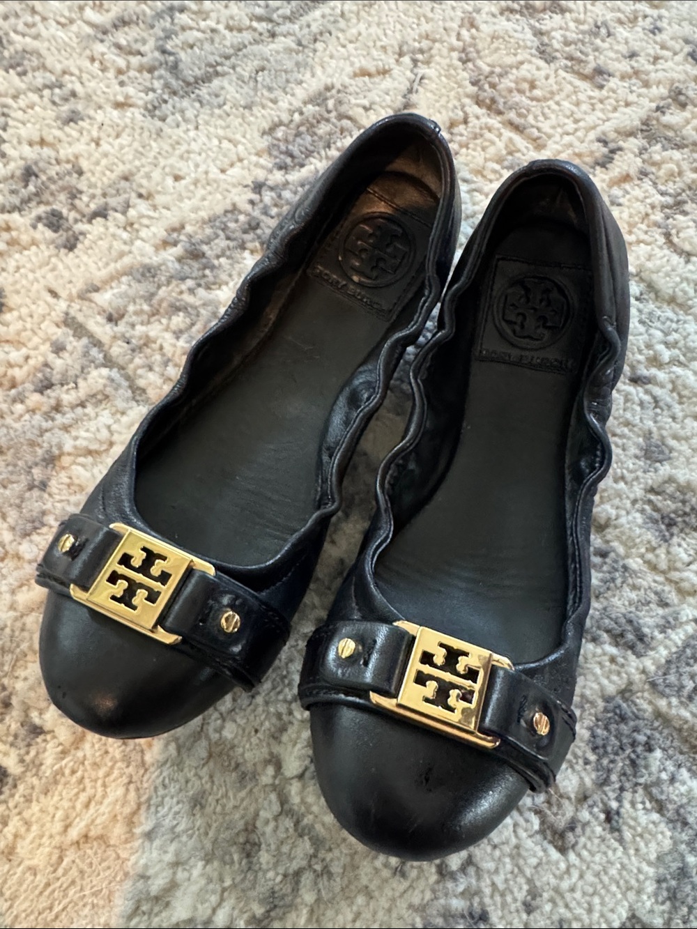 Tory Burch Black Leather Flats with Gold Logo Plaque